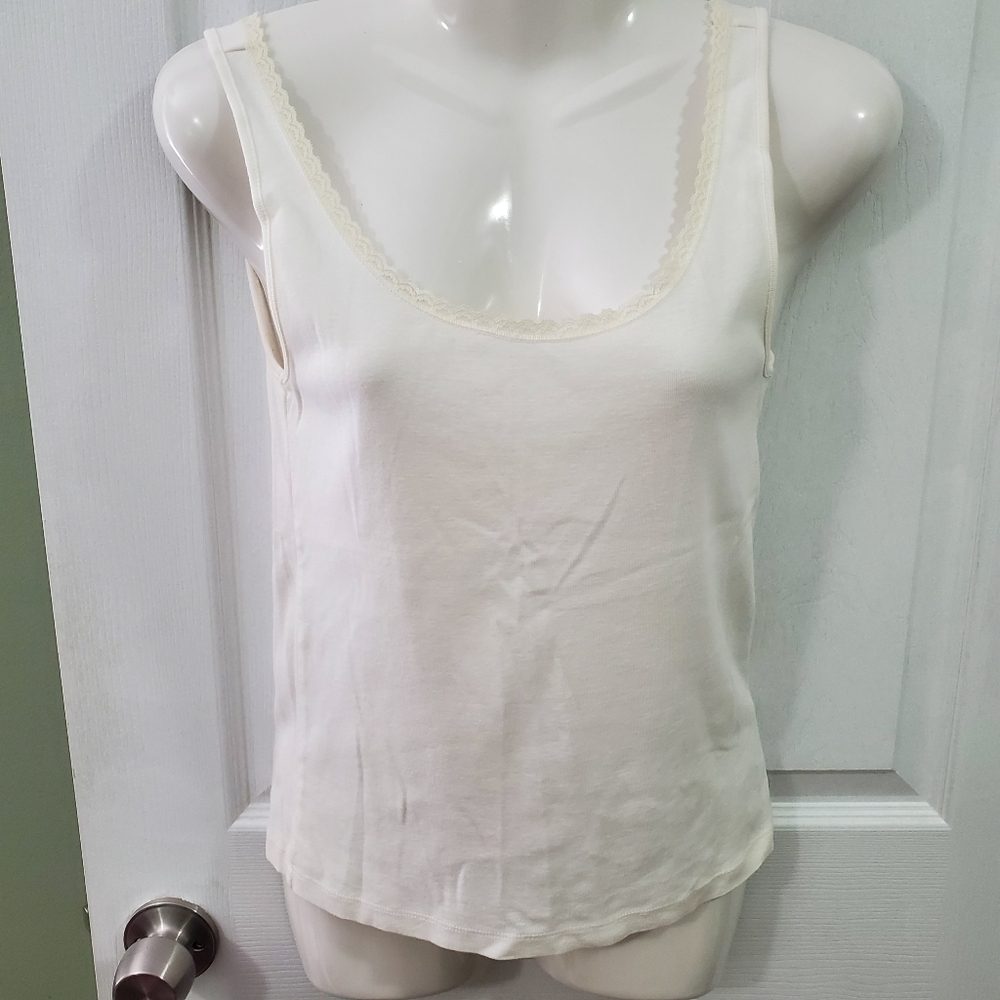 Off white colored tank with lace trim